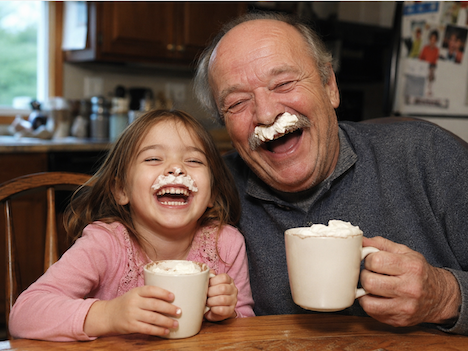 Kid and grandpa laughing
