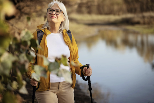 Lady senior walking in nature