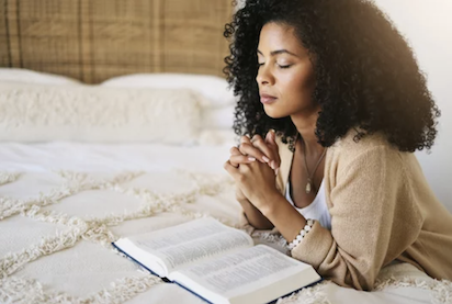 Lady black praying
